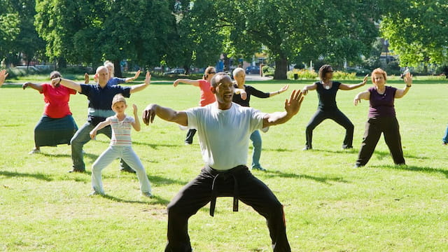 a group of people jumping in the air