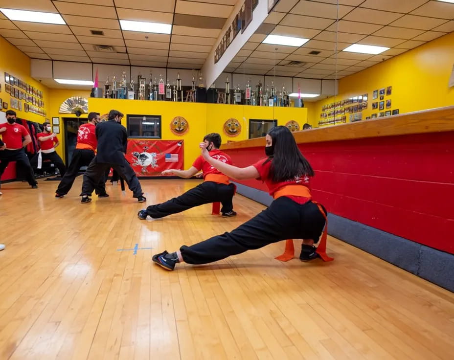 a group of people in a gym
