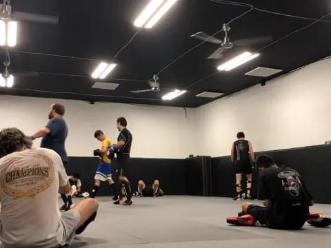 a group of people in a gym