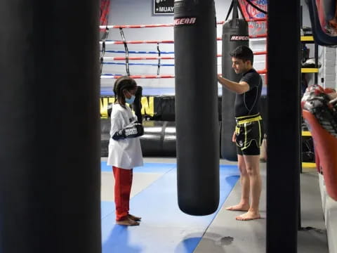 a man and a woman working out