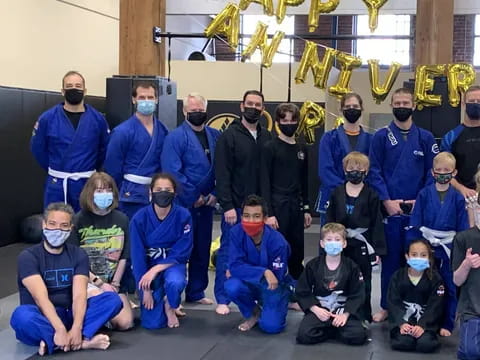 a group of people wearing masks