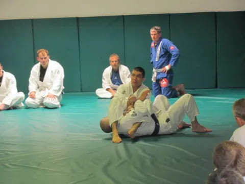 a group of men in white uniforms