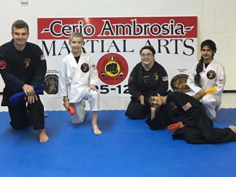 a group of men in karate uniforms