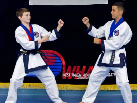 two men in karate uniforms