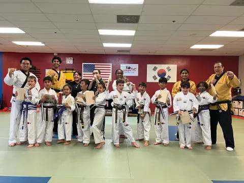 a group of people in karate uniforms