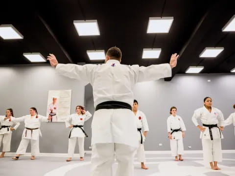a man in a karate uniform