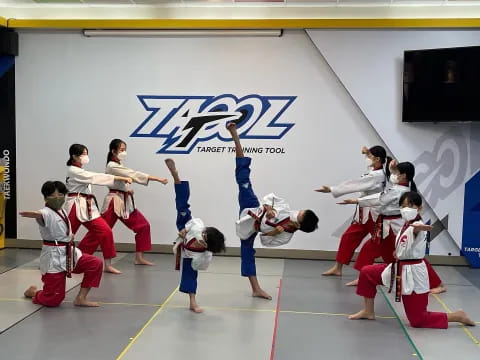 a group of people in a gym