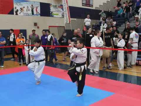 a group of people in karate uniforms