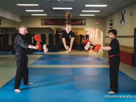 a group of people in a gym