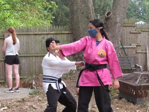 a group of people wearing masks
