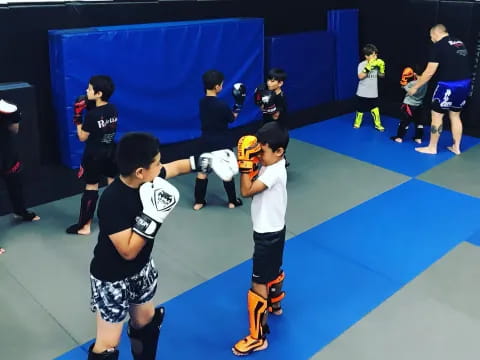 a group of kids wearing helmets