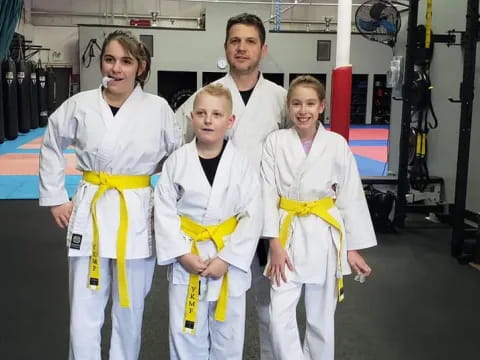 a group of people wearing karate uniforms