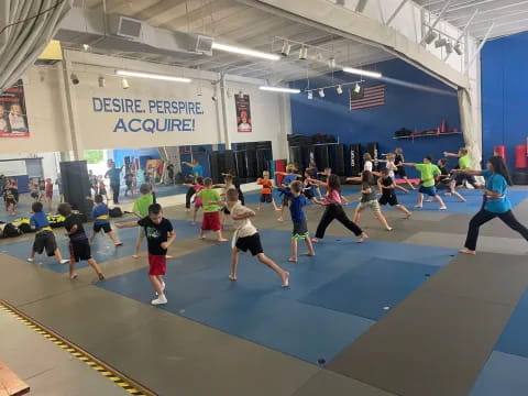 a group of people in a gym