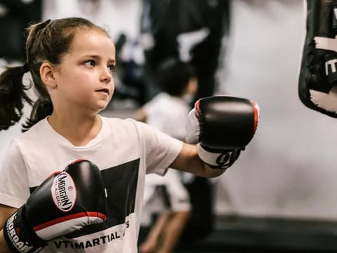 a person wearing boxing gloves