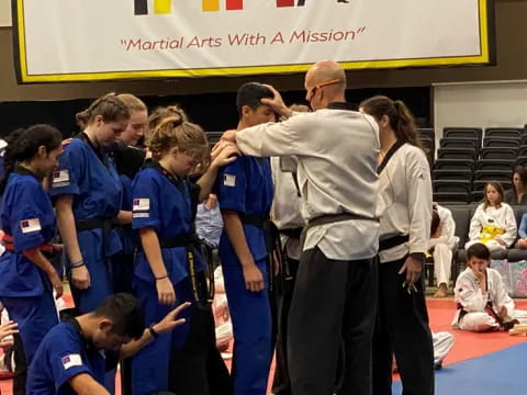 a group of people in blue uniforms