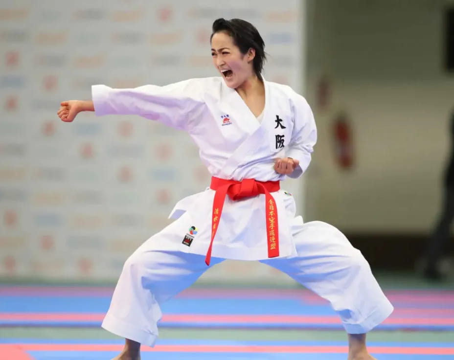 a person in a karate uniform