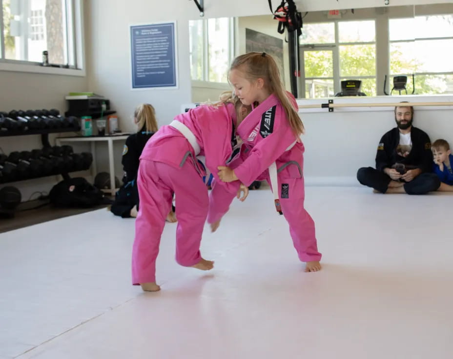 a girl in pink clothes