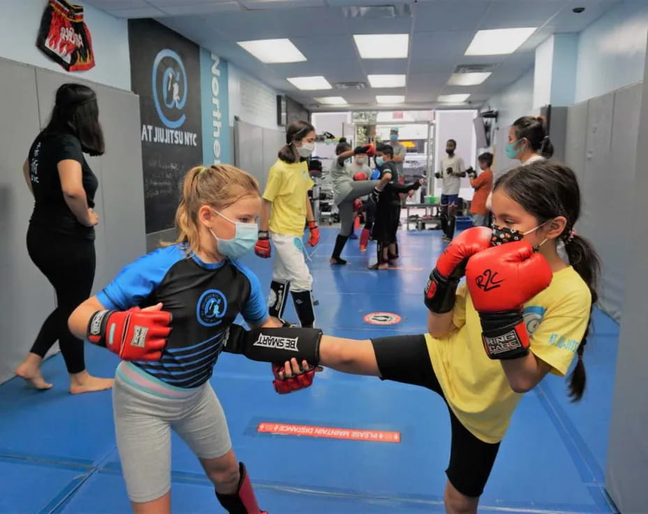 a group of women in a gym