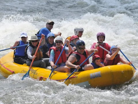 a group of people in a raft