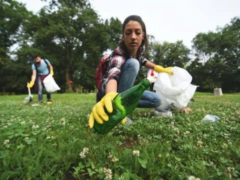 a person sitting in a grassy area