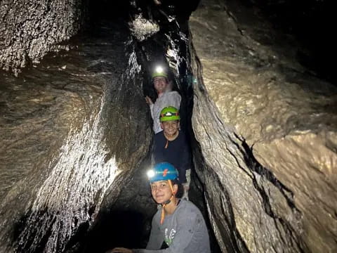 a group of people in a cave