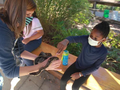 a person and a boy wearing masks