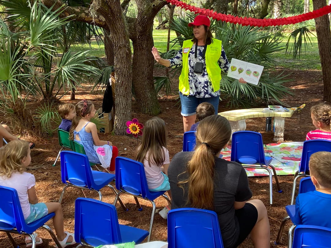 a group of people sitting in chairs