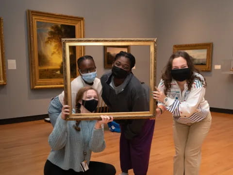 a group of people holding a sword