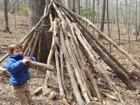 a child holding a stick