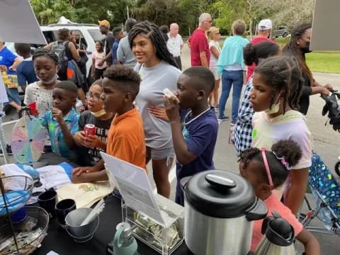 a group of children eating food