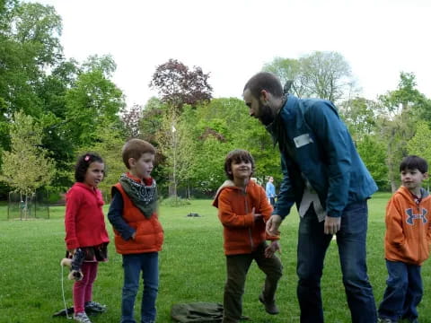 a person and a group of kids