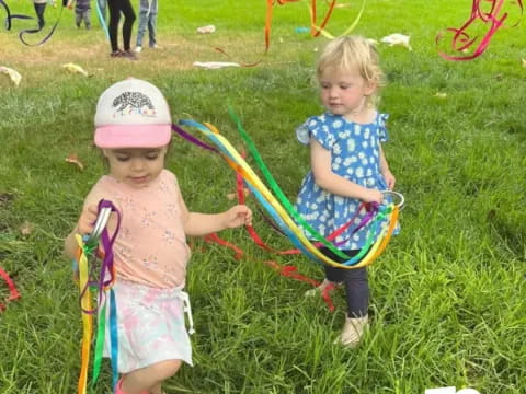 two children holding a toy
