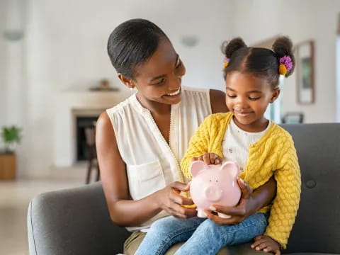 a person holding a baby