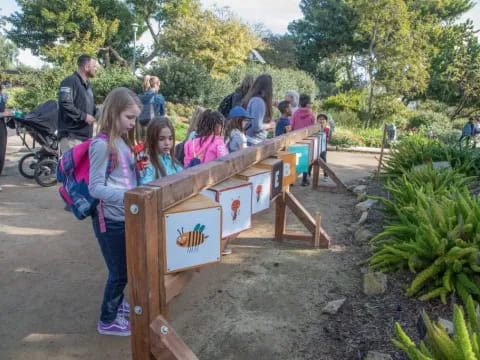 a group of people at a garden
