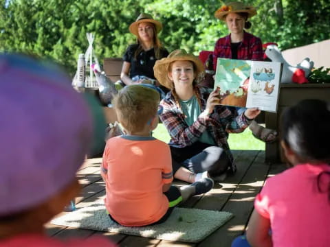 a group of people sitting outside