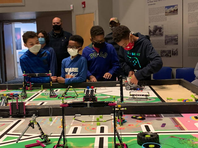 a group of people wearing masks