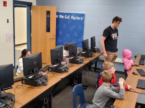 a group of people in an office