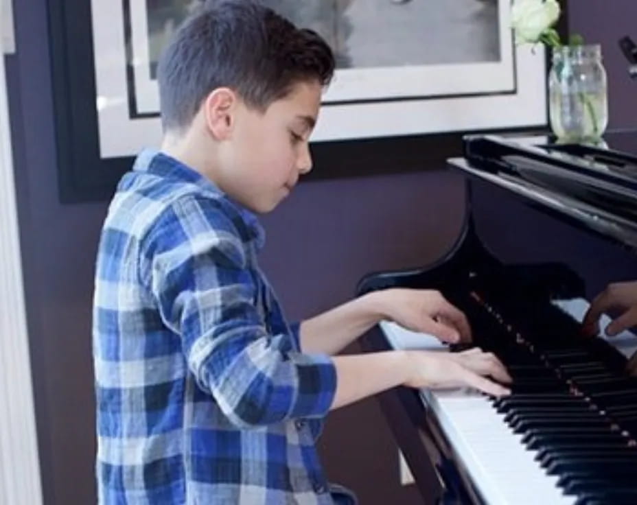 a man playing a piano