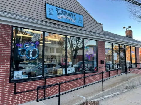 a store front with a sign