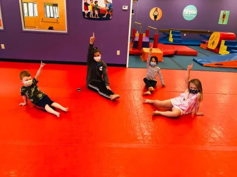 a group of people in a gym