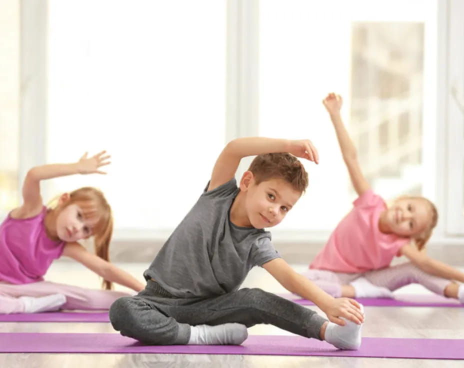 a group of children exercising