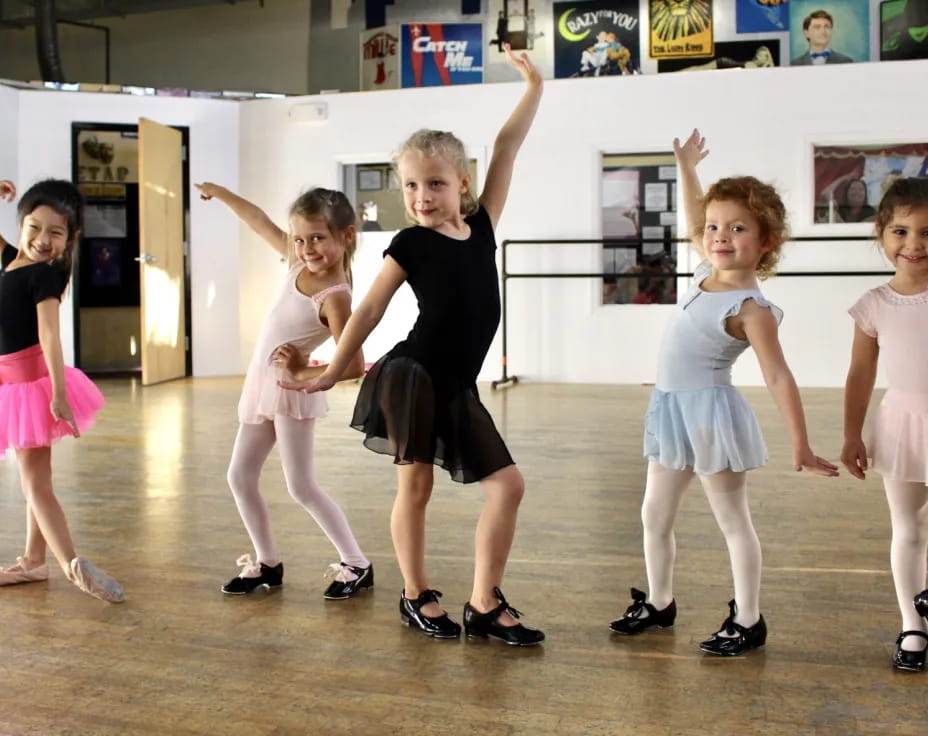 a group of children dancing