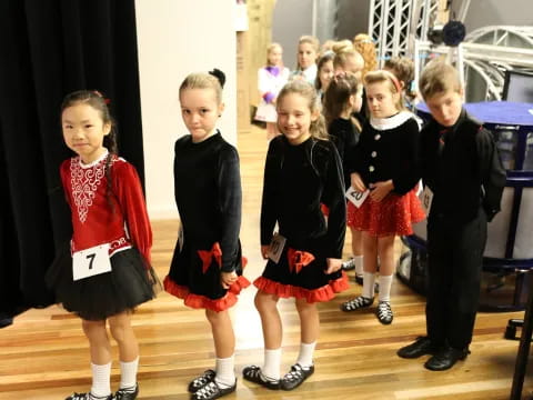 a group of children in uniforms