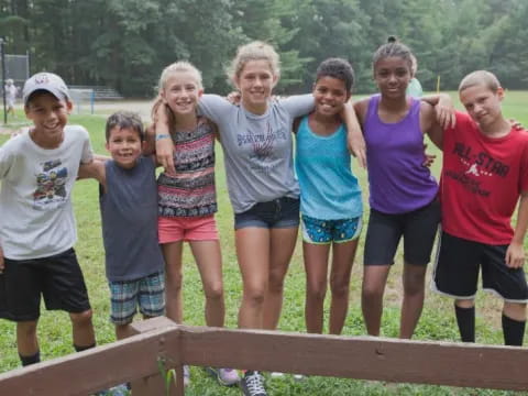 a group of people posing for a photo