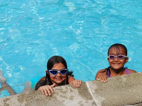 two girls in a pool