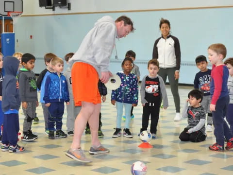 a person and a group of children