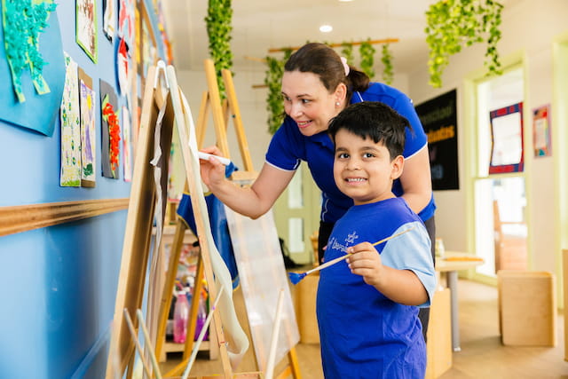 a group of boys painting