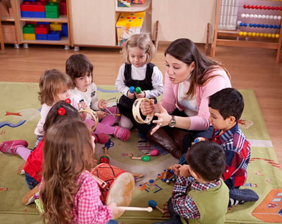 a group of children sitting on the floor