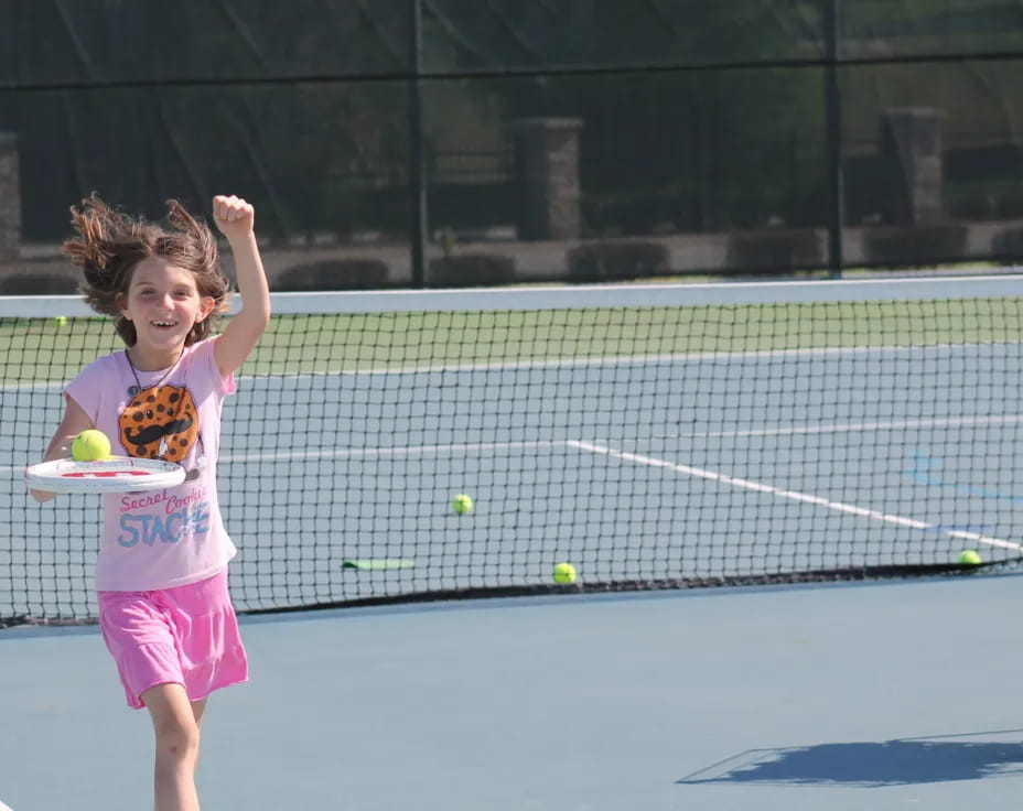 a girl playing tennis