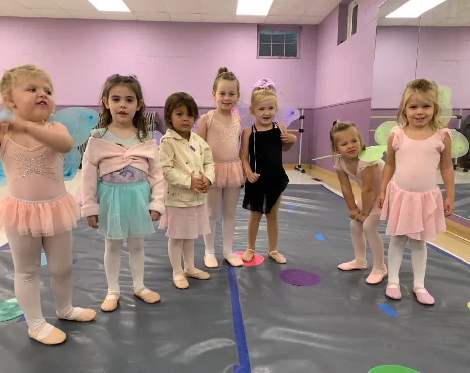 a group of girls in a room